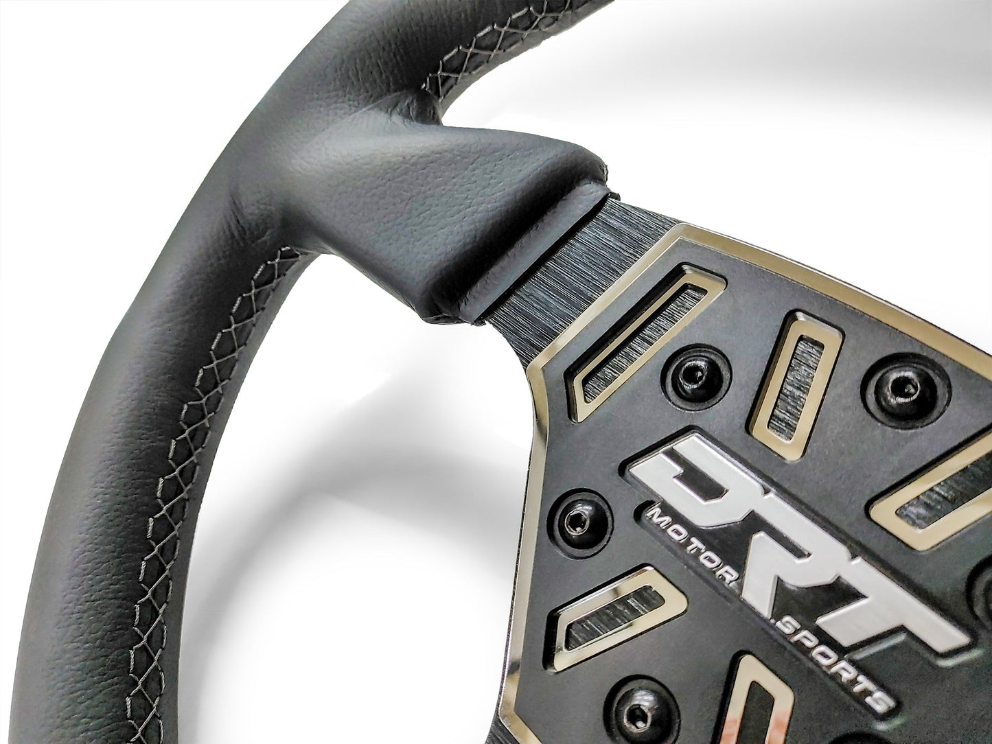 Details of a Round utv steering wheel in leather finish