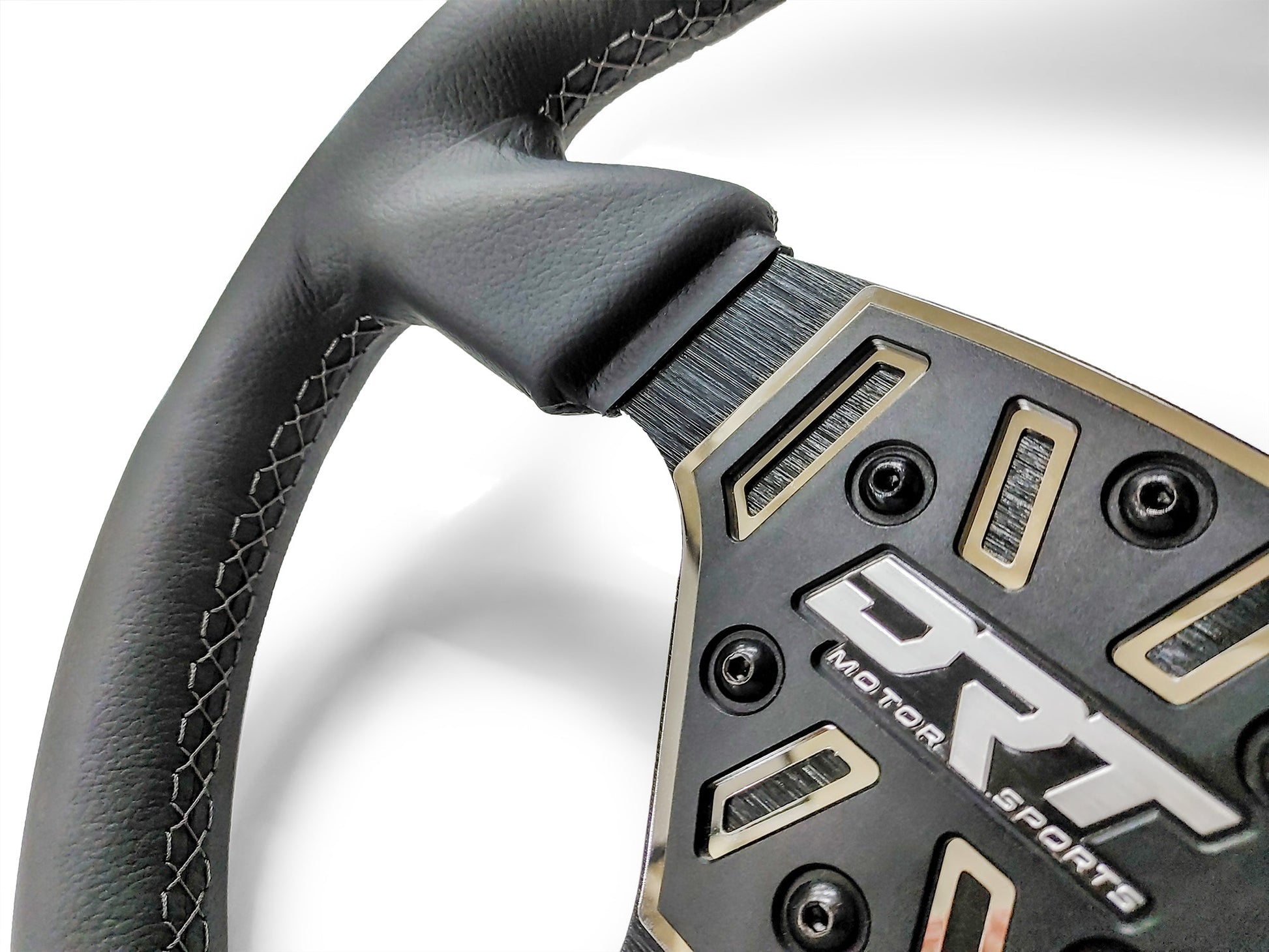 Details of a Round utv steering wheel in leather finish